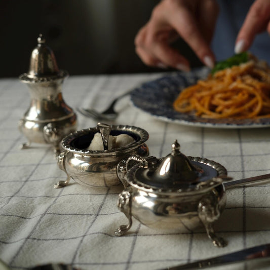 Timeless Elegance: Vintage Silver-Plated Spice Set with Cobalt Blue Glass Inserts
